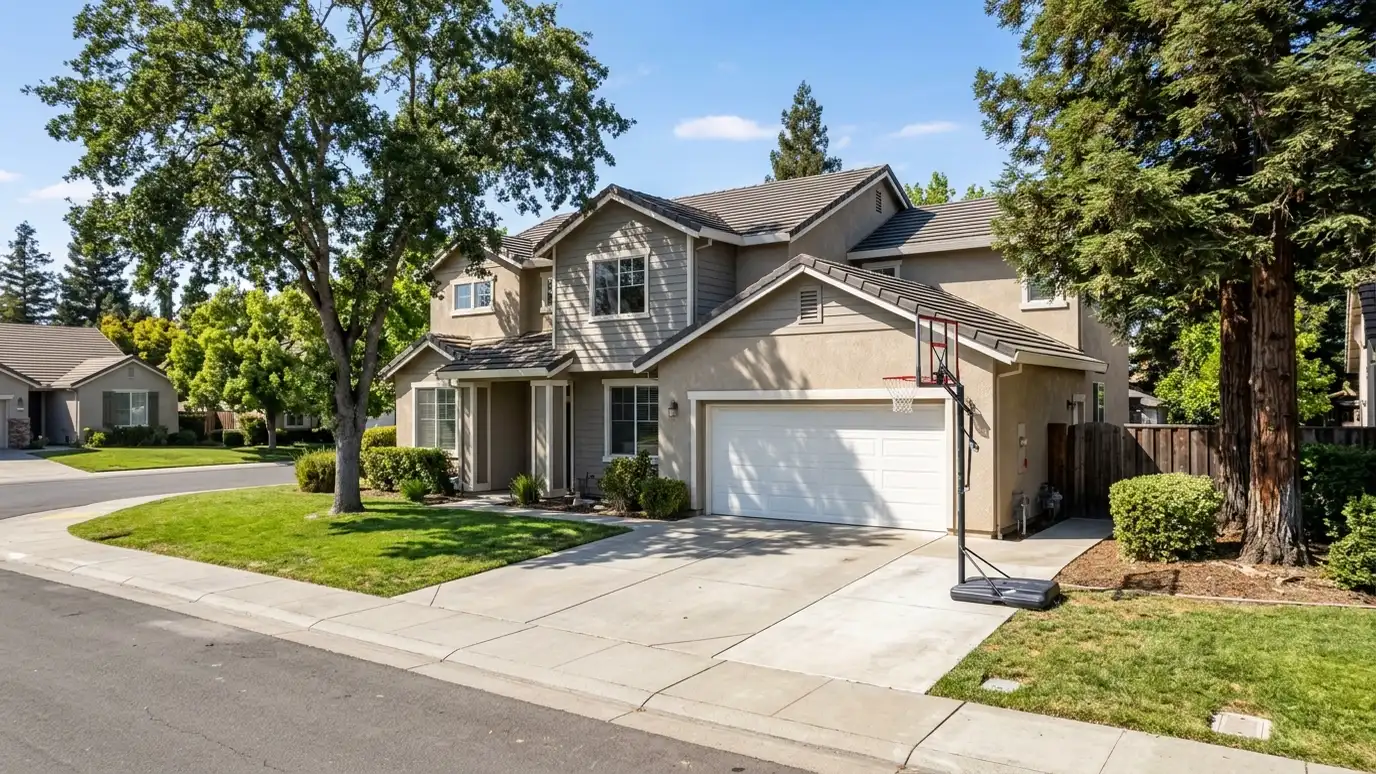 A well-kept home in Antioch, Tennessee with a clean garage door on a quiet street